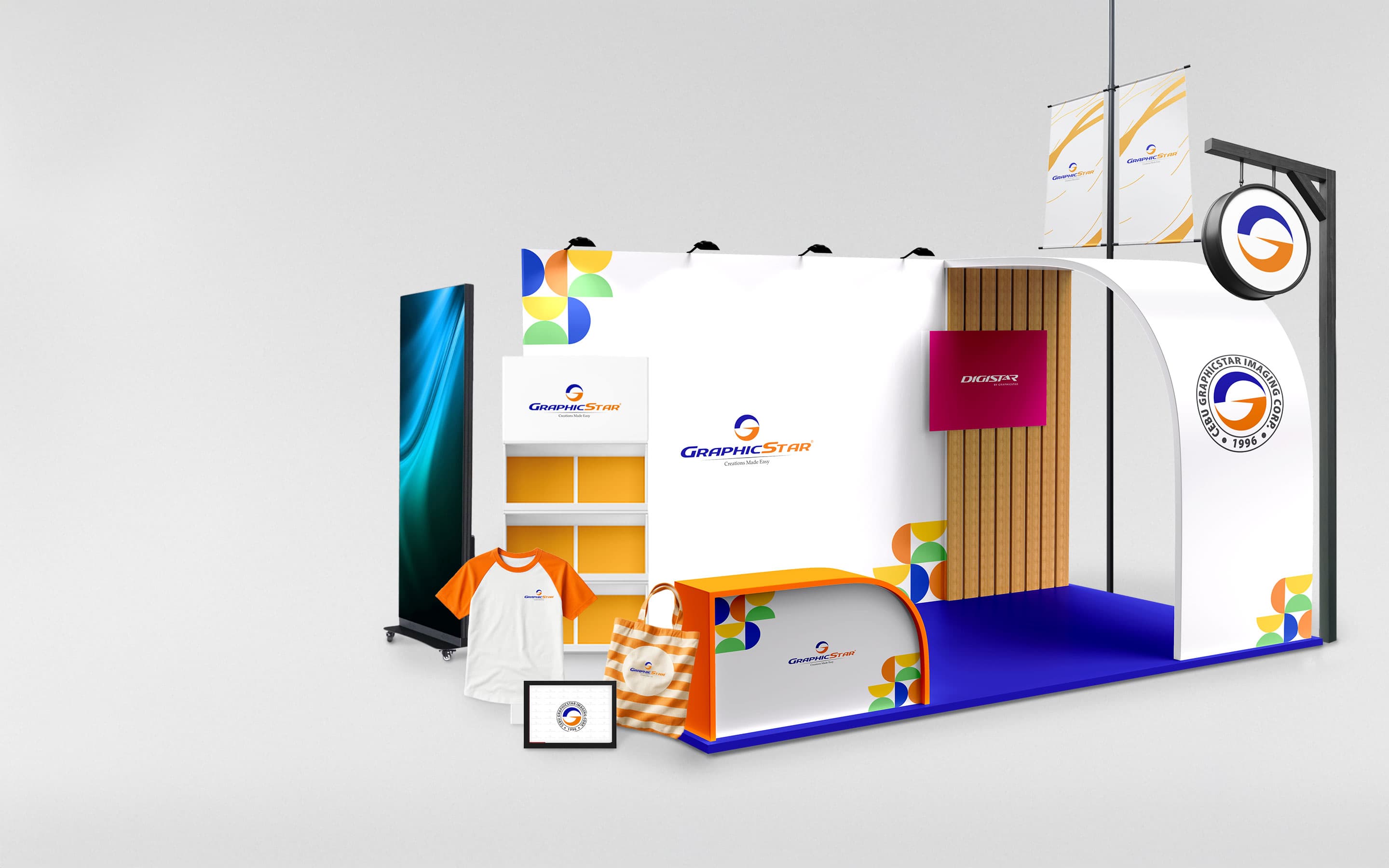 Cebu GraphicStar exhibition booth showcasing printed banners, standees, tarpaulins, shirts and tote bags